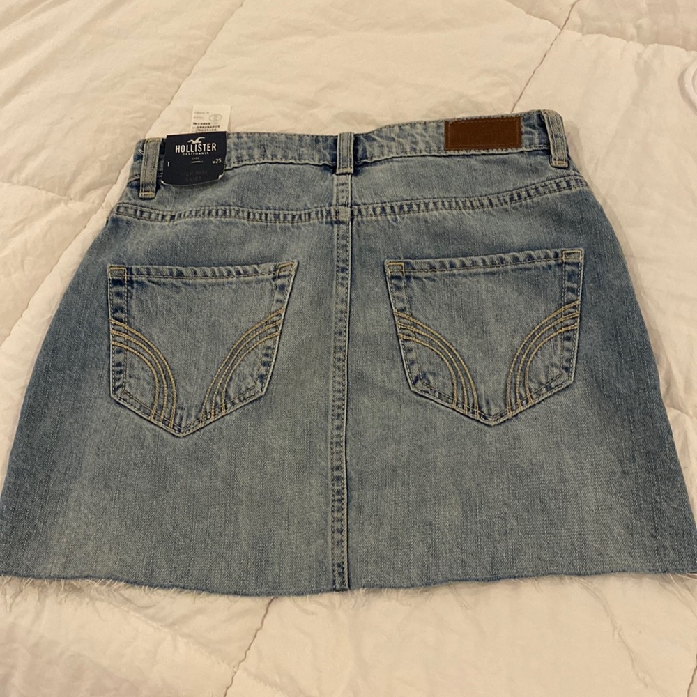 Hollister blue jean cut off skirt.